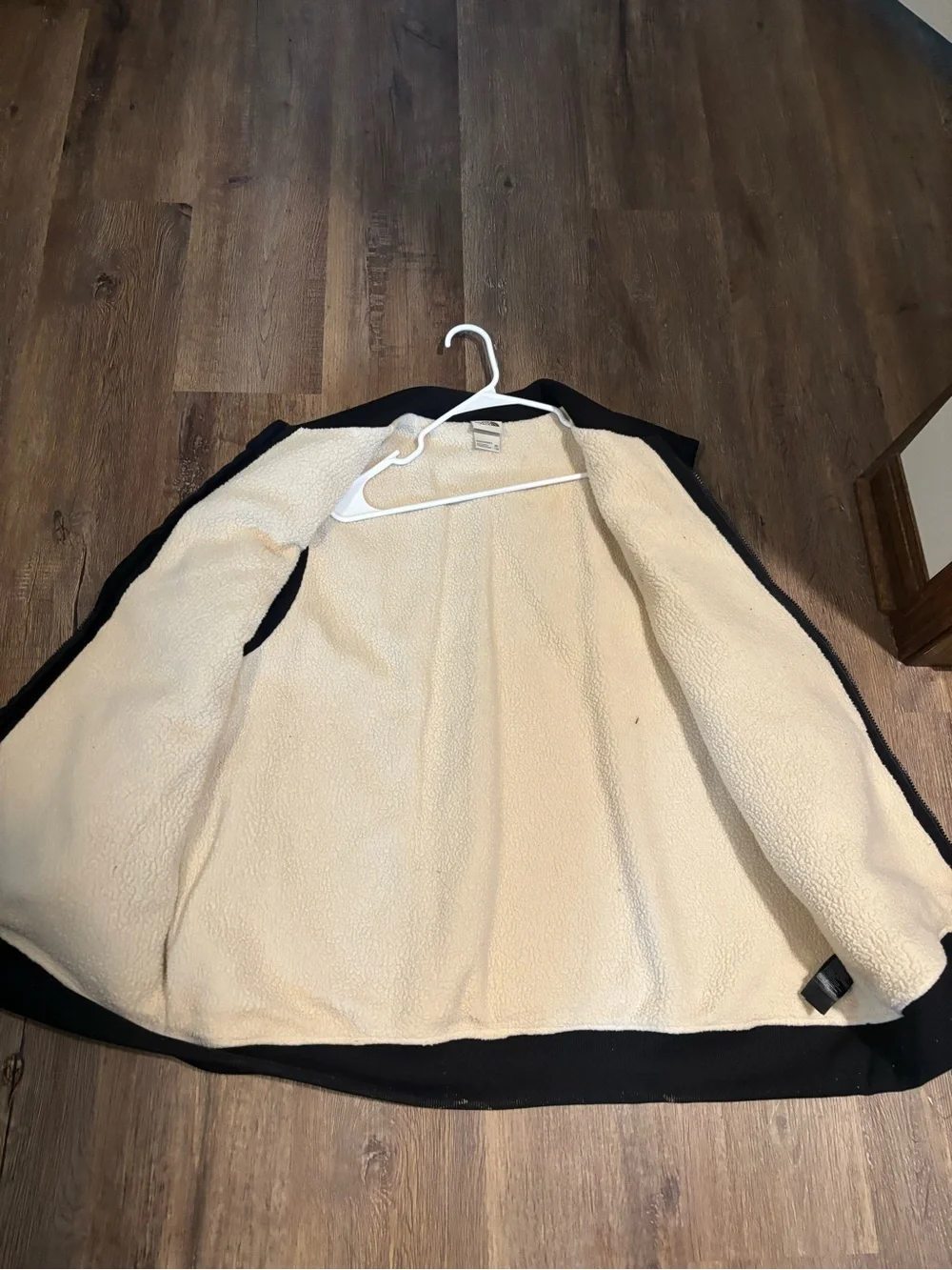 The North Face Black-Trim Cream Sherpa Fleece vest